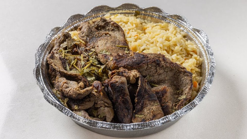 Food menu with Salvadoran-style dishes listed.